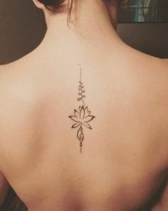 Upper Spine Tattoo