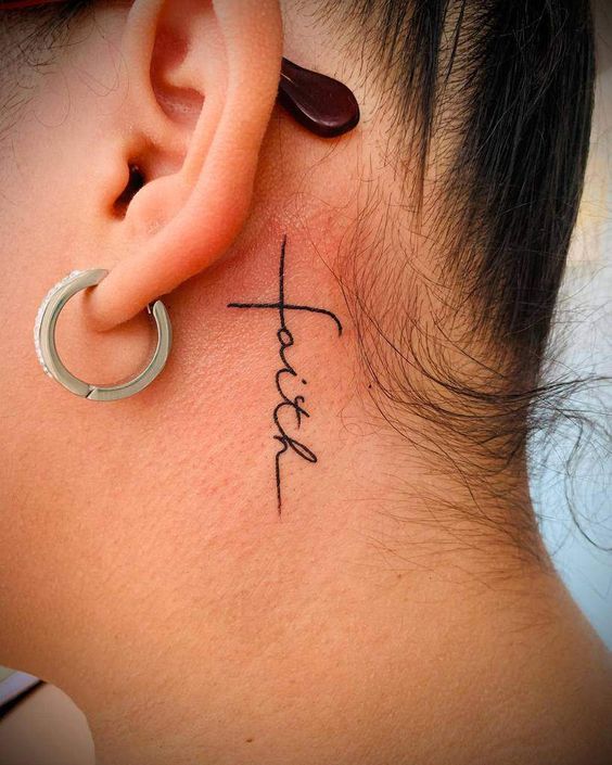 Word love tattoo located on the neck