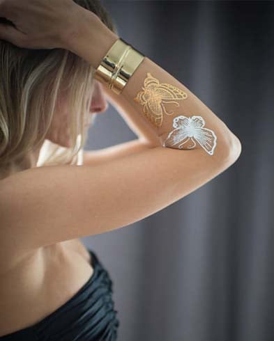 Butterfly tattoos on hands