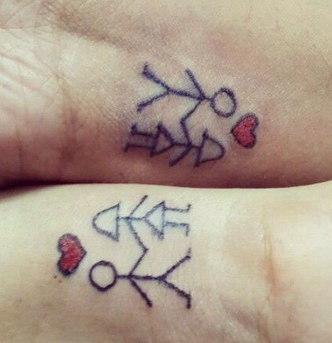 Loved up couple tattoo