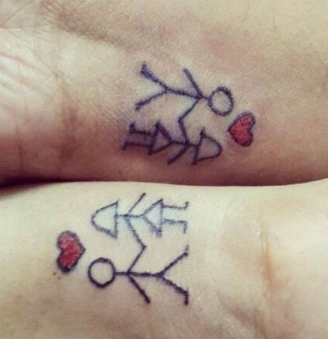 Loved up couple tattoo