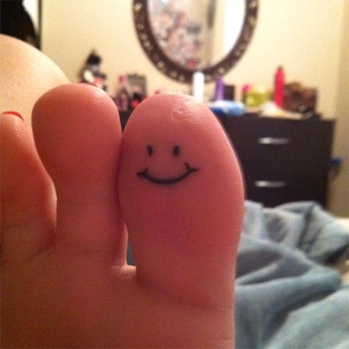 Small Smiley Face Tattoo