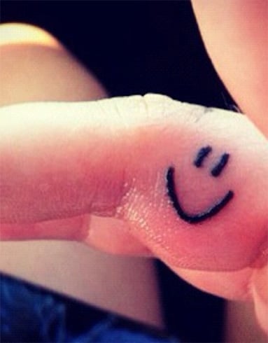 Smiley Face Toe Tattoo