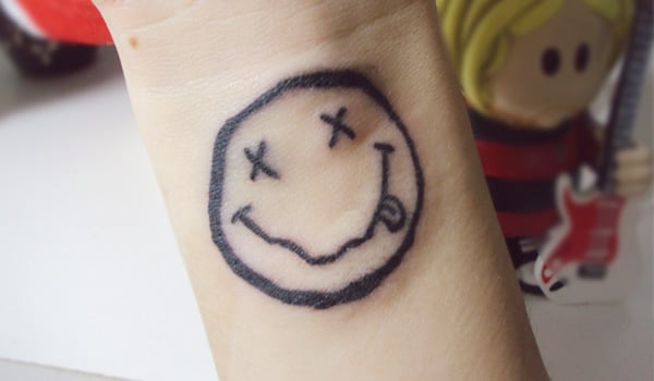 Louis Tomlinson Gets New Dagger Quote  Smiley Face Tattoos in Sydney  PopStarTats