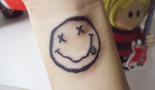 24 Wonderful Smile Wrist Tattoos  Tattoo Designs  TattoosBagcom