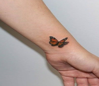 Butterfly Hand Tattoo