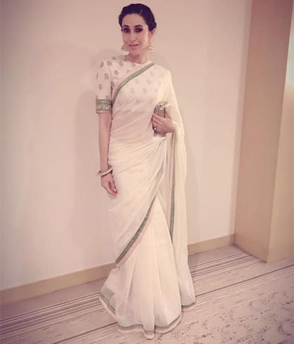 Chiffon saree with parrot green border blouse