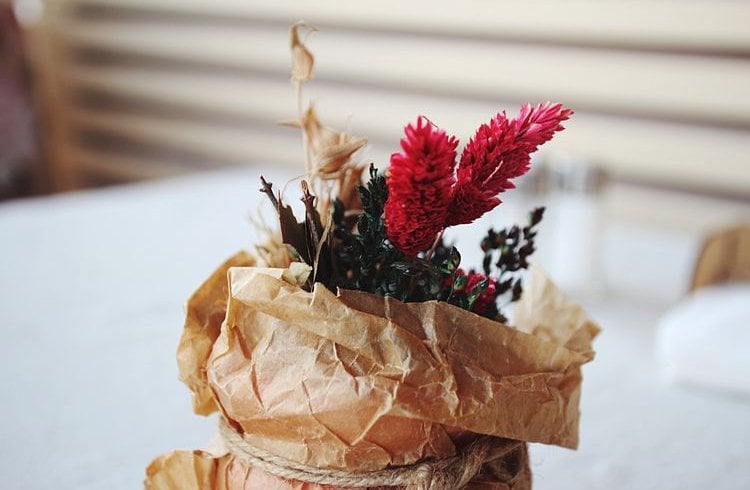 A Vase With A Paper Bag