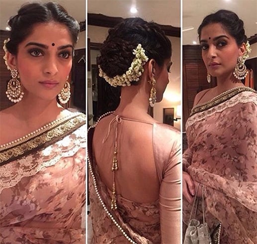 Sonam Kapoor in Half Moon Hairstyle with Gajra