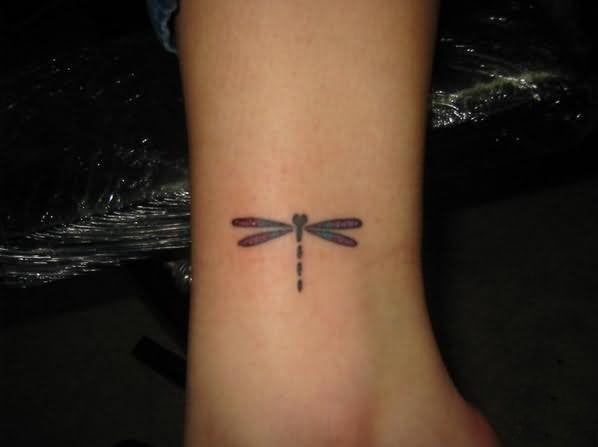 Simple Black Dragonfly Tattoo