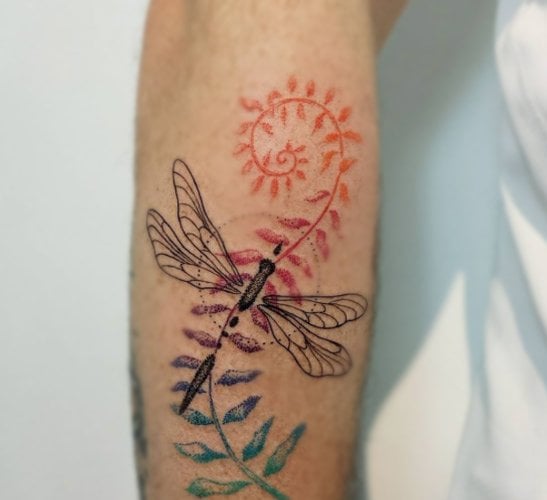 The dangling Dragonfly Tattoo
