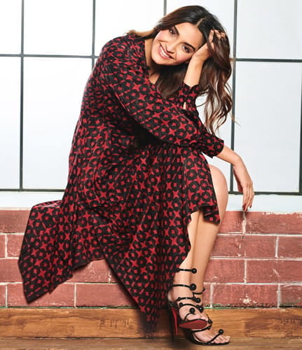 Sonam in red and black printed Fendi dress