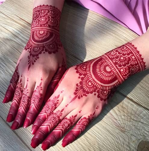 Red Mehndi Back Hand Design