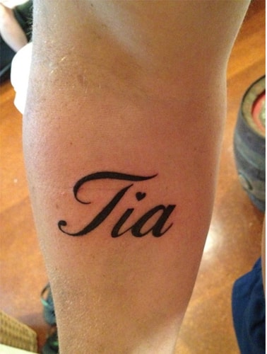 Name tattoos on the arm