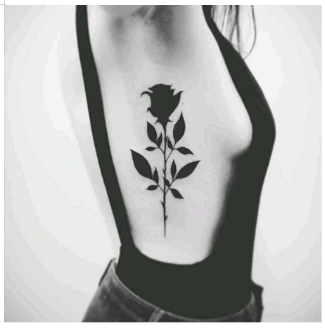 Single needle rose tattoo on the rib