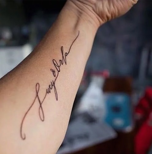 name tattoos on the hand