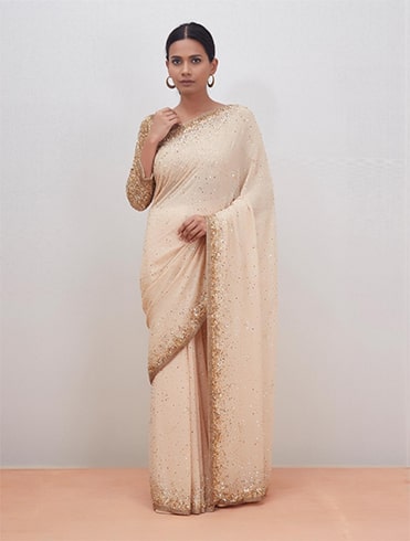 beige sequin saree with stitched blouse