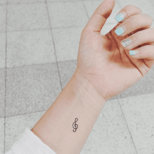 Small Music Clef Couple Tattoo Design  FMagcom