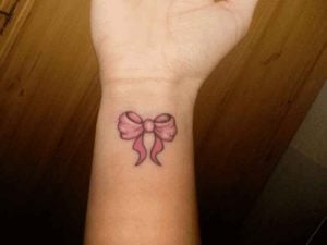 Pretty Pink Bow Wrist Tattoo